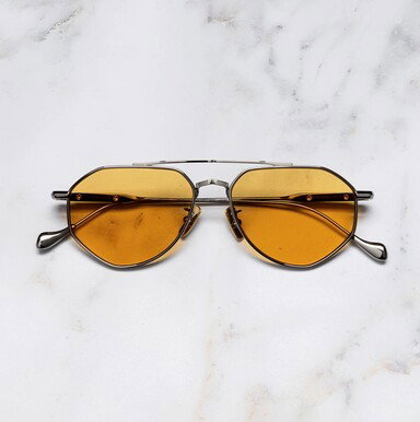 Frontal image of The Great Frog Lynott Aviator Sunglasses with marble background