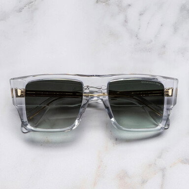 Frontal image of 1414 Rectangle Sunglasses with marble background